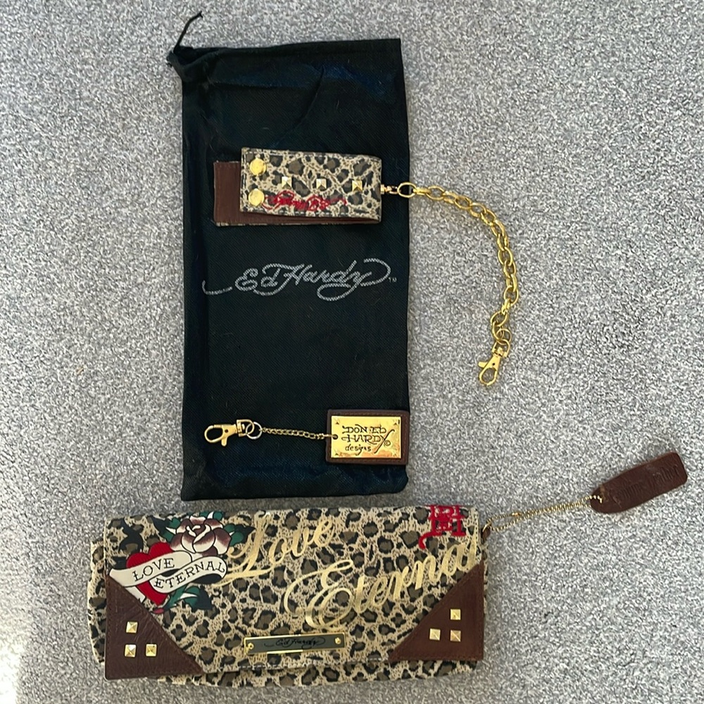 Ed Hardy leopard print clutch. Never used. Gold chain snap bracelet attaches
